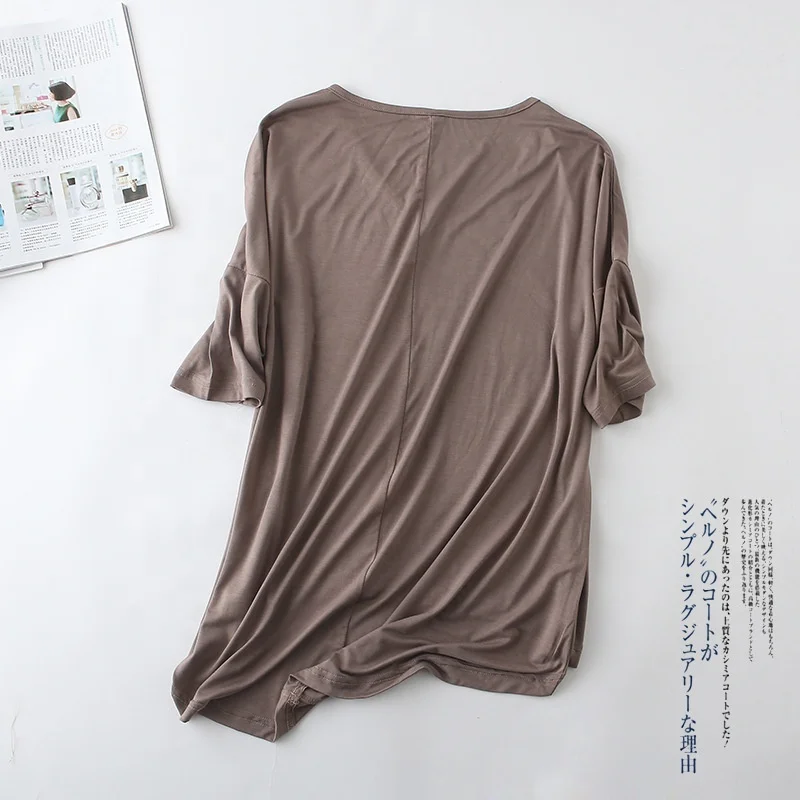 Spring and summer new bamboo fiber bat sleeve t shirt female casual version V collar solid color large size leggings
Spring and summer new bamboo fiber bat sleeve t shirt female casual version V collar solid color large size leggings