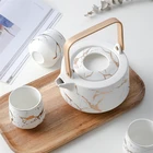 Wholesale drinkware bamboo handle teapot white marble porcelain tea set with tray