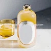 hot popular clear 500ml glass boston bottle kombucha bottles with aluminum gold color screw caps
