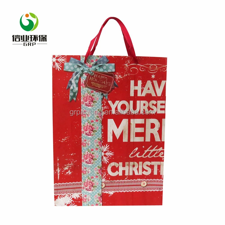 christmas flowers and bowknot red ribbon handle paper gift bag
