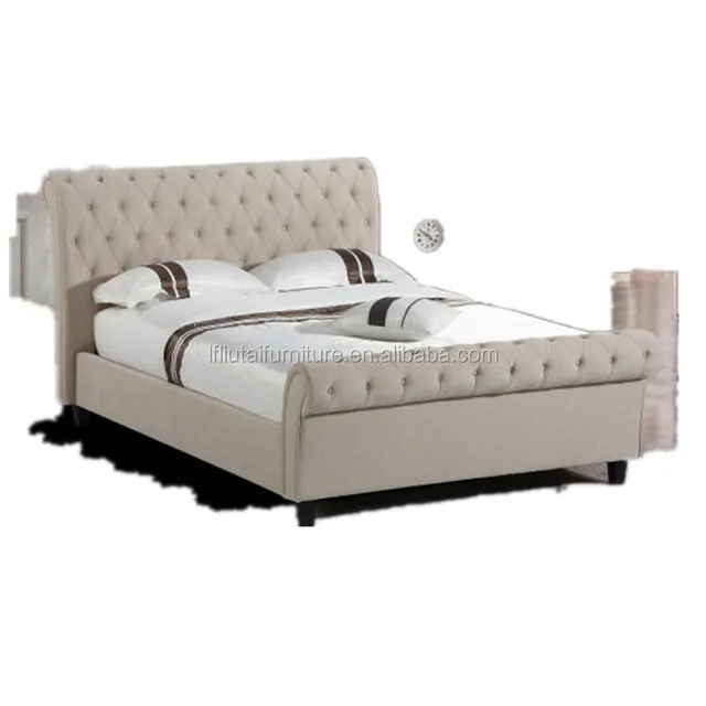 white wooden bedstead