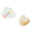 heart shape orange flavor jelly with coconut pulp