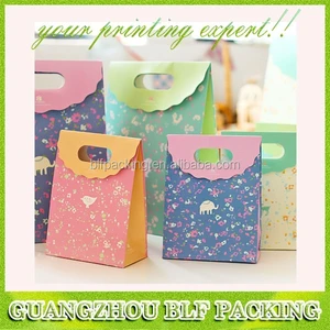 custom matt decorate sealable gift paper bag for die cut handles
