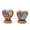 /product-detail/souvenir-heart-shape-figurine-resin-figurine-for-home-decoration-62210056816.html