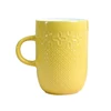 big yellow ceramic embossed pattern glazaed coffee mugs with handle customized logo no spoon