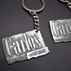 Custom Antique silver nickle cheap raised logo letter keychain