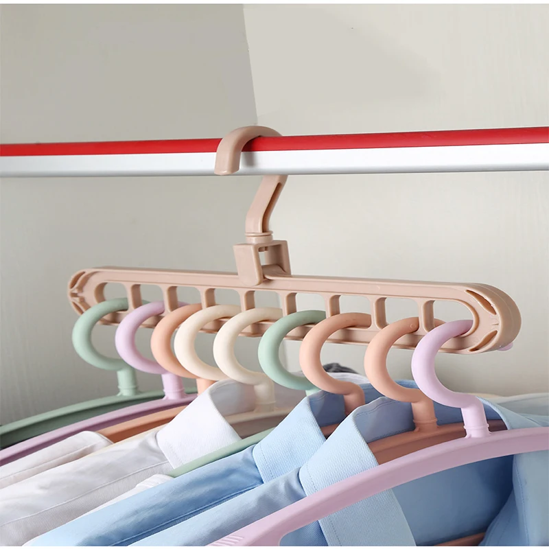 China nine-hole 360-degree revolving magic hanger multi-functional folding magic hanger wardrobe airing and hanging clothes, 2 colors
China nine-hole 360-degree revolving magic hanger multi-functional folding magic hanger wardrobe airing and hanging clothes, 2 colors