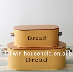 colorful metal vintage bread box with bamboo cutting board lid