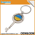 Custom best quality souvenir spinning keyholder key shaped cross keyring