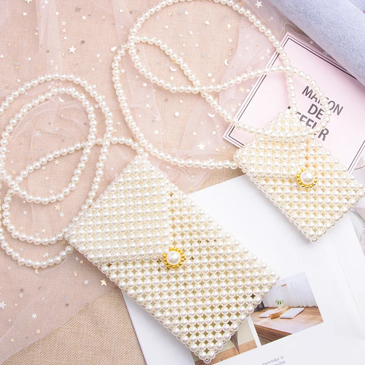 Fashion Luxury Handmade Imitation Pearl Women Clutch Bag Elegant White Pearl Braid Mini Shoulder Bag For Women Ladies
Fashion Luxury Handmade Imitation Pearl Women Clutch Bag Elegant White Pearl Braid Mini Shoulder Bag For Women Ladies