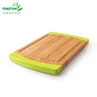 Quality bamboo butcher chopping board with green silicone