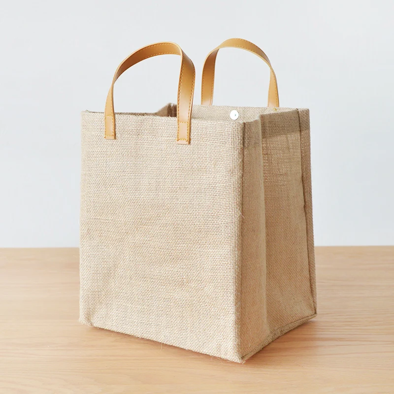 Factory bulk wholesale reusable recycled jute tote bag with leather handle, Natural color
Factory bulk wholesale reusable recycled jute tote bag with leather handle, Natural color