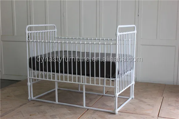 white iron baby bed