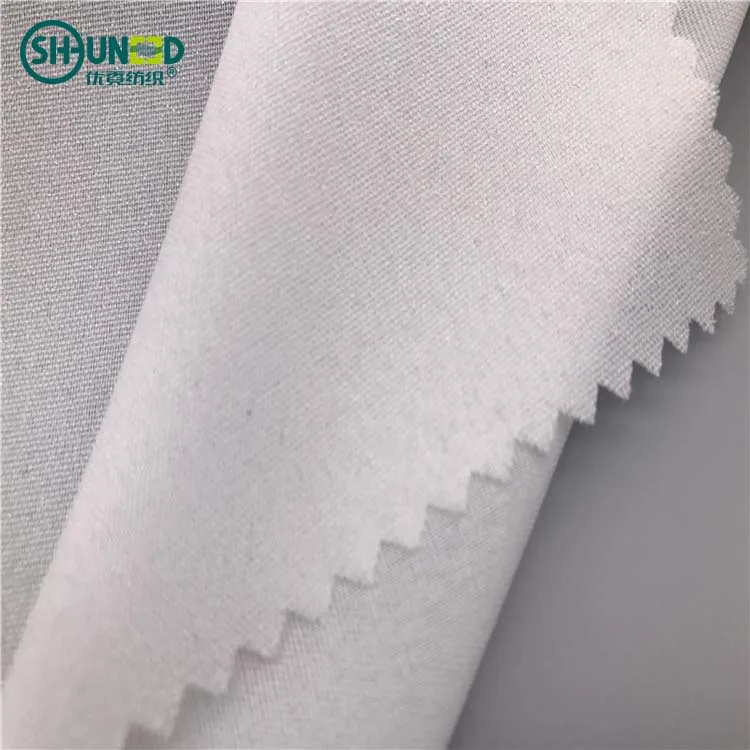 Chinese supplier for garment enzyme washed double dot pa coating 30D water jet low stretch plain weave woven fusible interlining