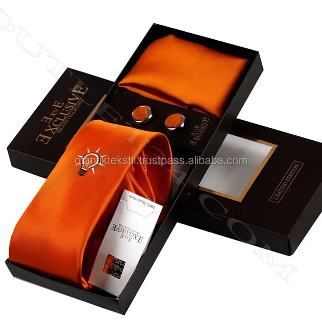 orange, tie box, necktie with pocket squareand cufflink set neck