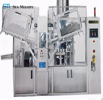 Toothpaste tube filling and sealing machine