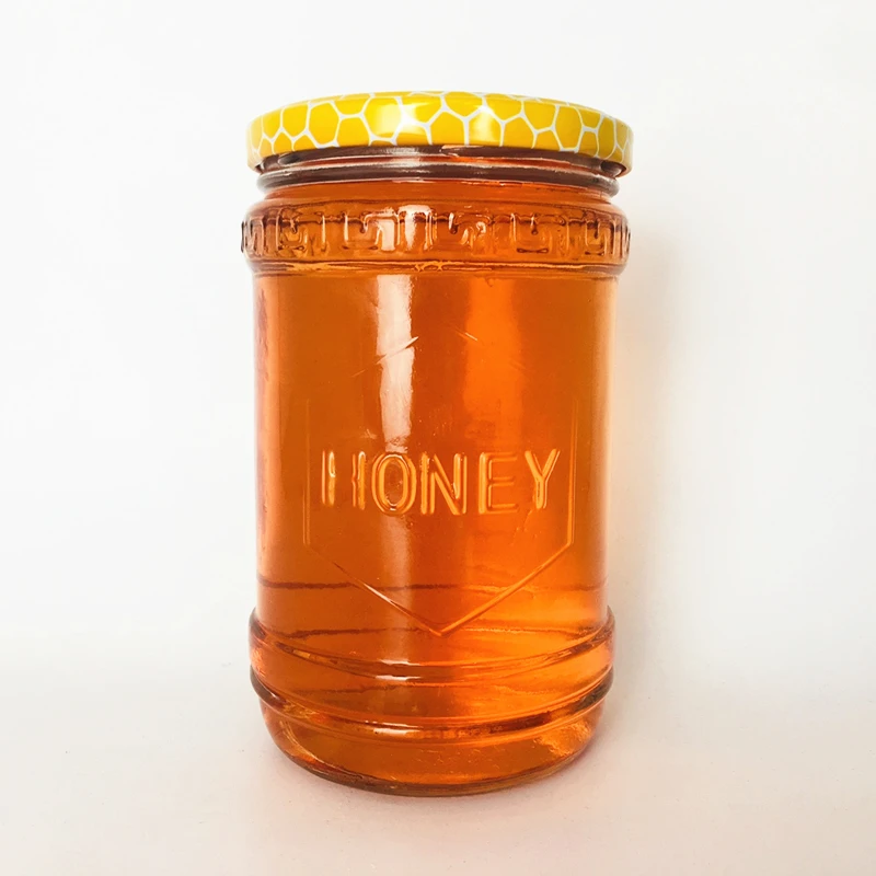 Wholesale empty 600ml clear glass jar unique shape honey storage with design logo lid
Wholesale empty 600ml clear glass jar unique shape honey storage with design logo lid