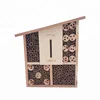 Wooden natural bee and insect house with inclined roof