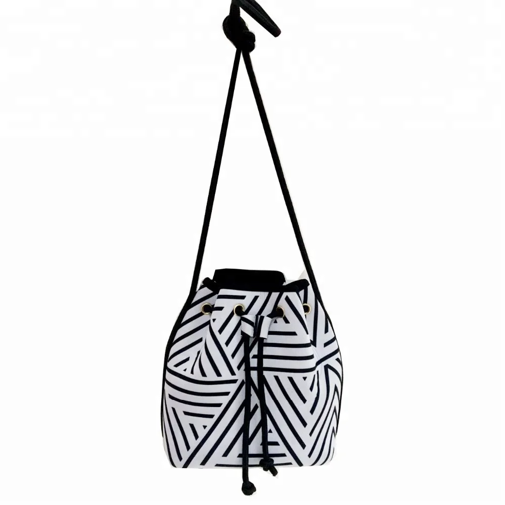 Fashion customized printing drawstring waterproof perforated neoprene bag women sling bag, Black and white stripe
Fashion customized printing drawstring waterproof perforated neoprene bag women sling bag, Black and white stripe