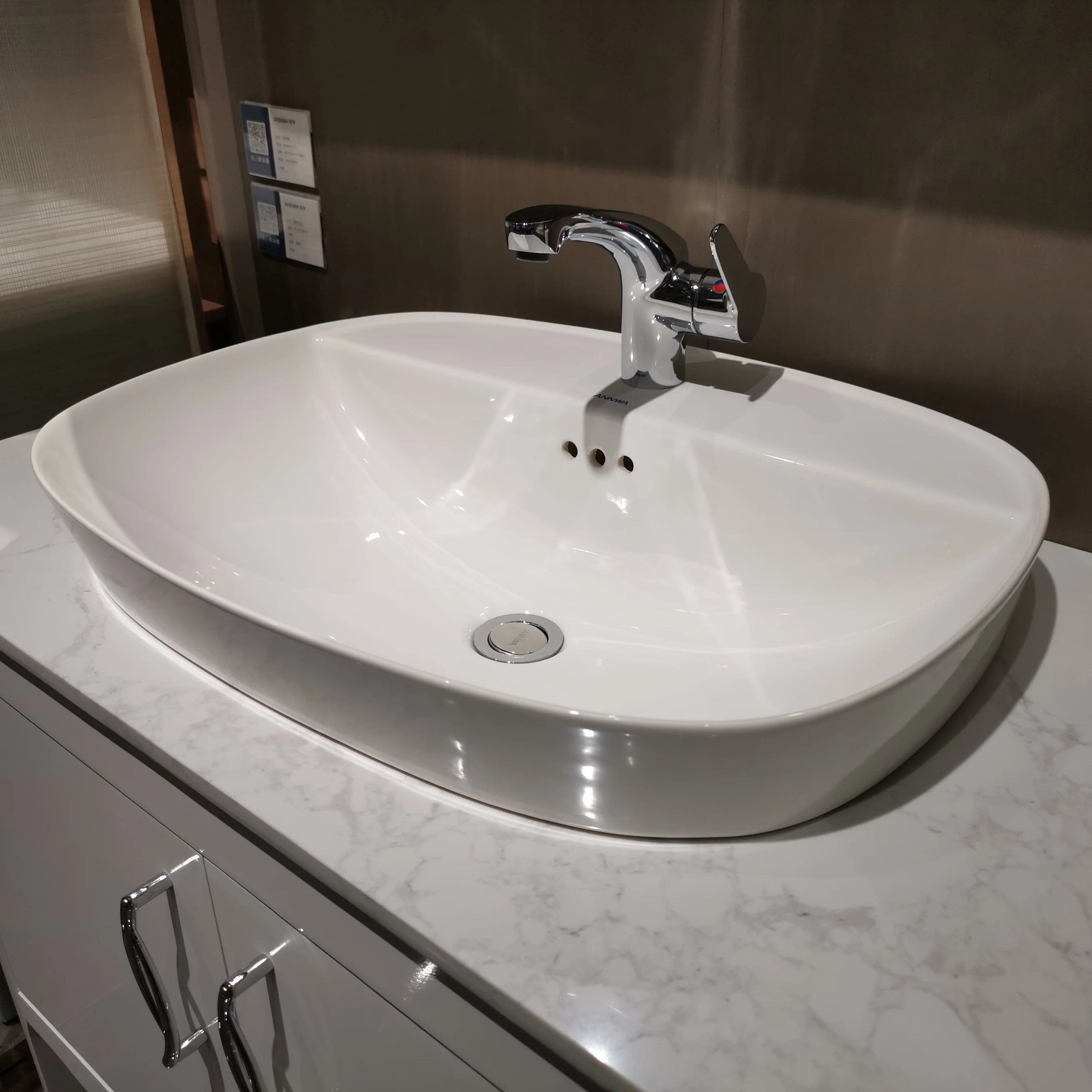 NT21 China Single Hole Countertop Sink Oval Ceramic Countertop Basin