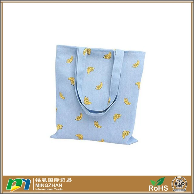 blue canvas tote bag with tropical yellow banana print