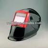 Automatic darkening welding helmet