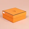 Simple square orange paper box gift with custom logo