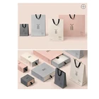 Graceful/elegant warm color boutique paper packaging bag OBM customized design