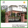 artistic wrought iron double entrance outdoor gate