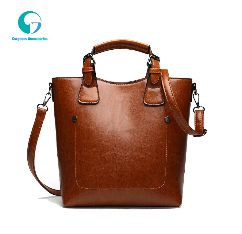 Brand women's shoulder bag 2021 new simple shoulder bucket handbag retro Joker woman portable cross body bag
Brand women's shoulder bag 2021 new simple shoulder bucket handbag retro Joker woman portable cross body bag