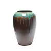 Wholesale ancient style black stone flower vase rough surface
