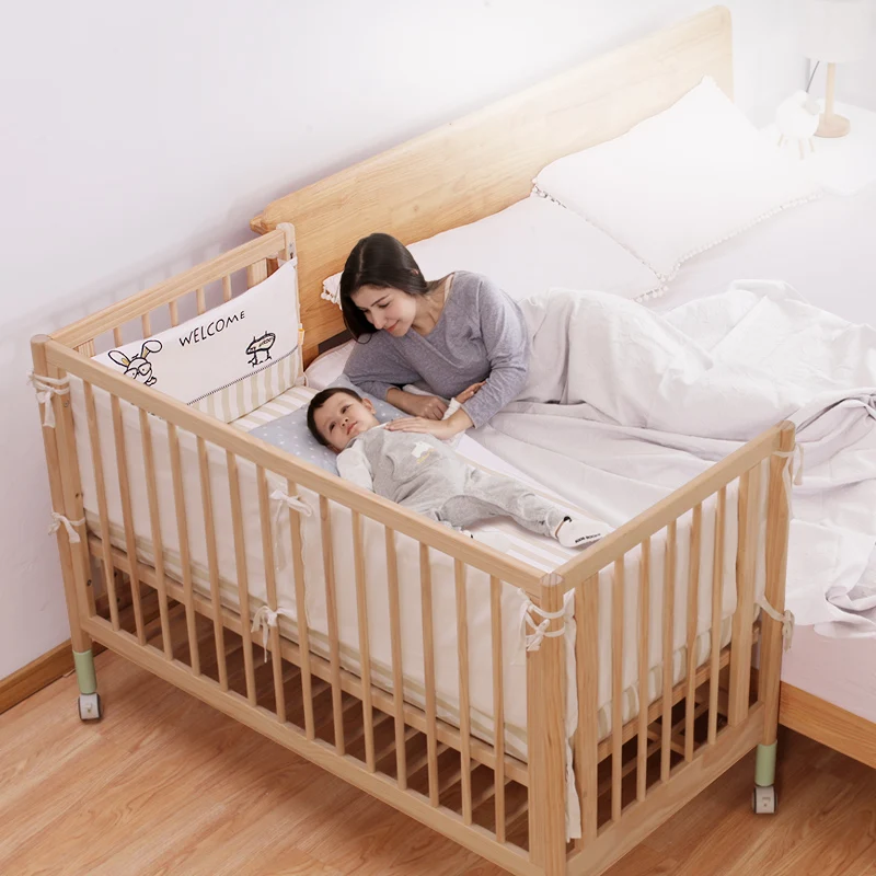 crib attached to bed