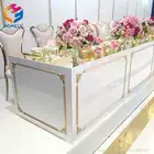 round glass coffee table with stainless steel table rose gold color