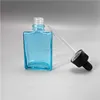 2017 high quality 30ml fancy rectangular blue glass dropper bottle 1oz,custom shape essential oil bottle dropper