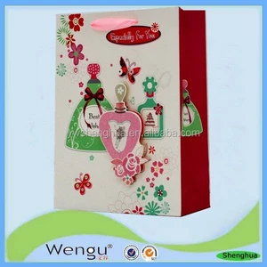 latest design glitter gift 3d paper bag for wrapping with ribbon