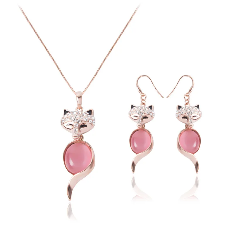 Wholesale Rose Gold Cute Fox Pendant Necklace Earring Set Pink Crystal Cat Eye Stone Animal Pendant Jewelry Set
Wholesale Rose Gold Cute Fox Pendant Necklace Earring Set Pink Crystal Cat Eye Stone Animal Pendant Jewelry Set