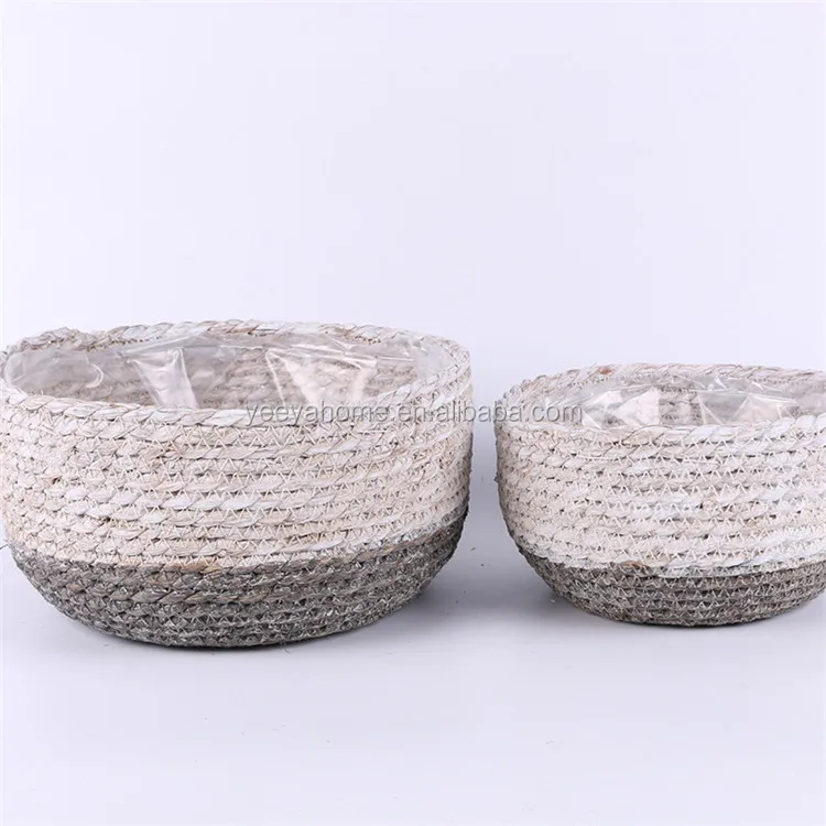 white and grey natural rattan seagrass round plant basket with