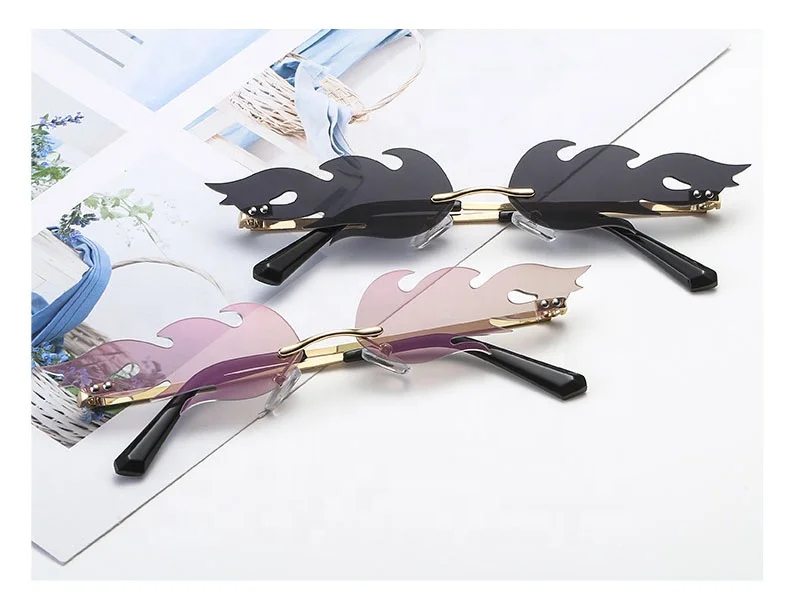 custom trendy ladies latest fashion small fire shaped designer rimless metal sunglasses for women, Custom sunglasses
custom trendy ladies latest fashion small fire shaped designer rimless metal sunglasses for women, Custom sunglasses