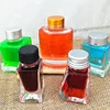 Manufacturers direct sales of 15ml ink bottle square color glass bottle transparent fountain pen water bottle