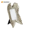 /product-detail/hot-sale-resin-angel-wings-silver-gold-finish-photo-frame-table-desk-top-decor-60745508253.html