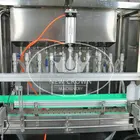Filling Machine Glass Bottle Machine Auto Liquid Flow Filling Machine In PET Bottles Or Glass Bottle Or Can Or Jar Or Other Container.