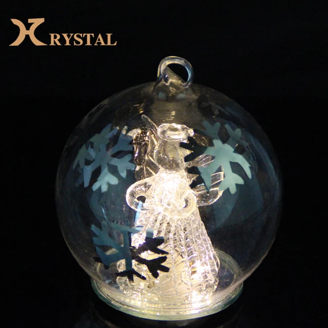 glass ball gift with angel inside