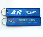 China Supplier Wholesale Promotional Customized Embroidered Fabric Key Chain
