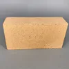 Low creep refractory brick for cement kiln linings