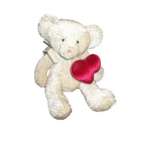 teddy bear with red heart as gift for baby for lovers