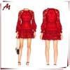 Embroidered red lace knit dress Hidden back zip closure Braid and fringe trim Tiered ruffled edges beautiful lace club dress