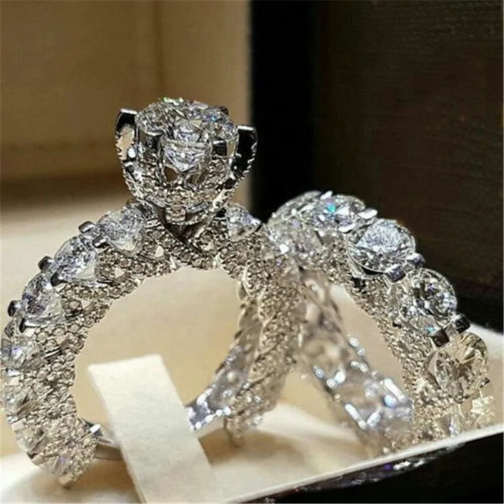 Sterling Silver Bridal Set Engagement Wedding Ring Bands with Round and Princess Cut Cubic Zirconia
Sterling Silver Bridal Set Engagement Wedding Ring Bands with Round and Princess Cut Cubic Zirconia