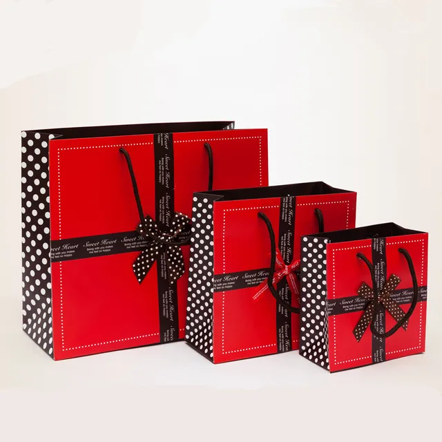 red colorful wedding gift handle bag with ribbon