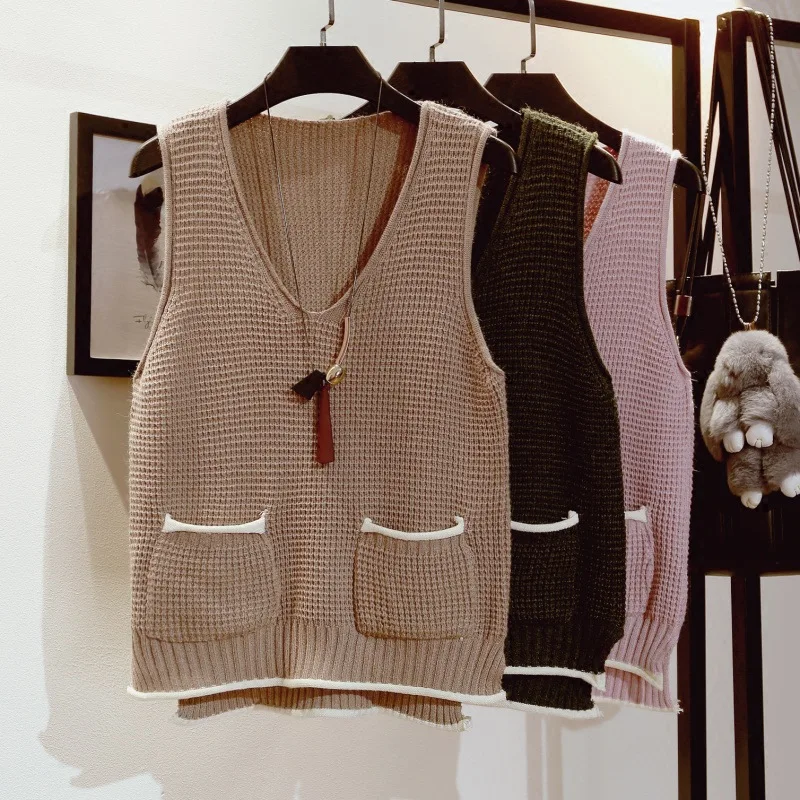 Ladies winter v neck short front back long side split double packet sleeveless vest sweater
Ladies winter v neck short front back long side split double packet sleeveless vest sweater