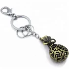 Cheap direct sell custom bronze pouch shape engraved metal keychain with keyring